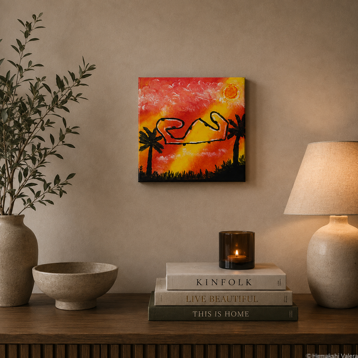 Catalan Sunset, an original orange sunset F1 circuit painting, hanging above a sideboard in a warm interior