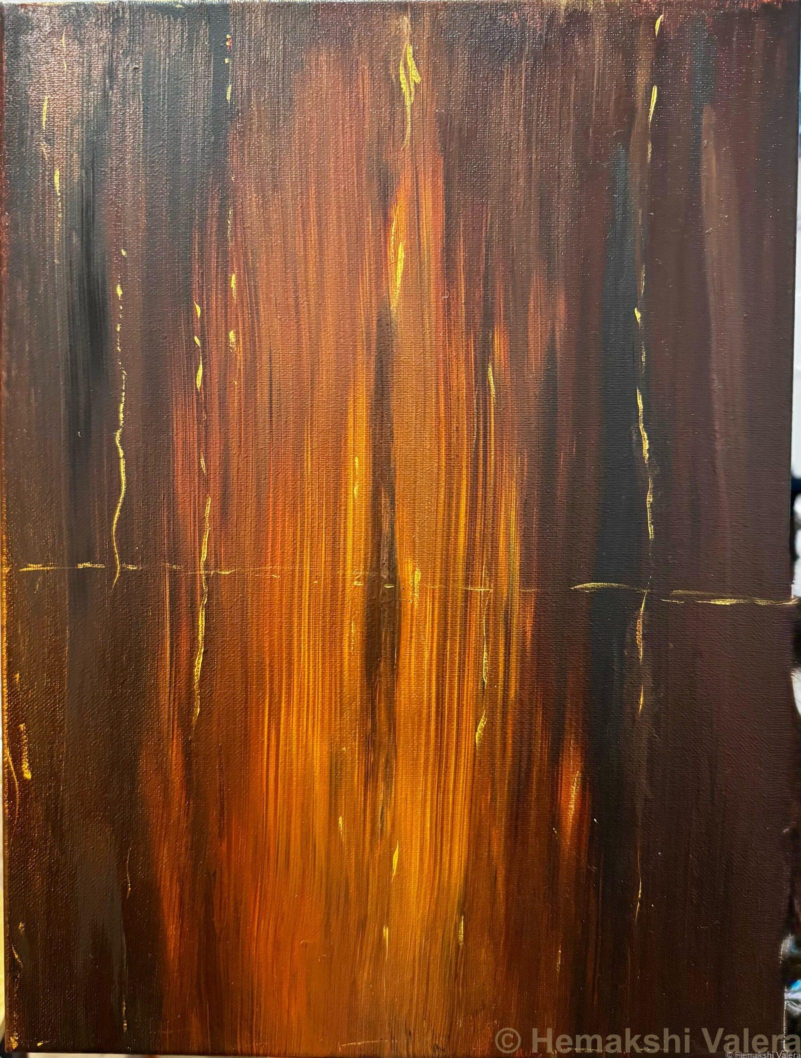 Abstract acrylic painting in deep brown and amber with a vertical column of golden orange light rising through dark earth tones, by Australian artist Hemakshi Valera