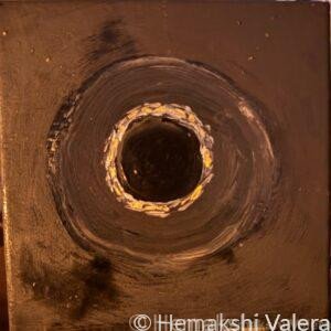 Abstract acrylic painting on black with a circular void ringed in silver and gold at the centre, by Australian artist Hemakshi Valera