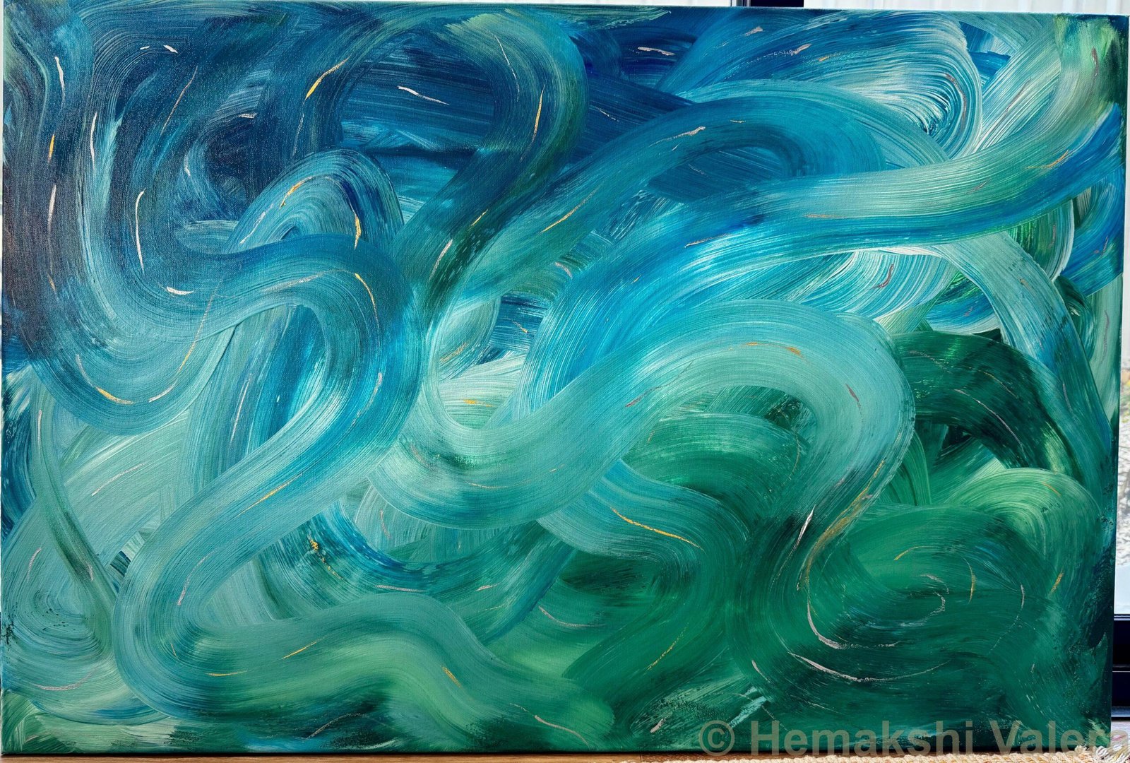 Large abstract acrylic painting in teal, emerald green and deep blue with sweeping brushstrokes and gold accents, by Australian artist Hemakshi Valera