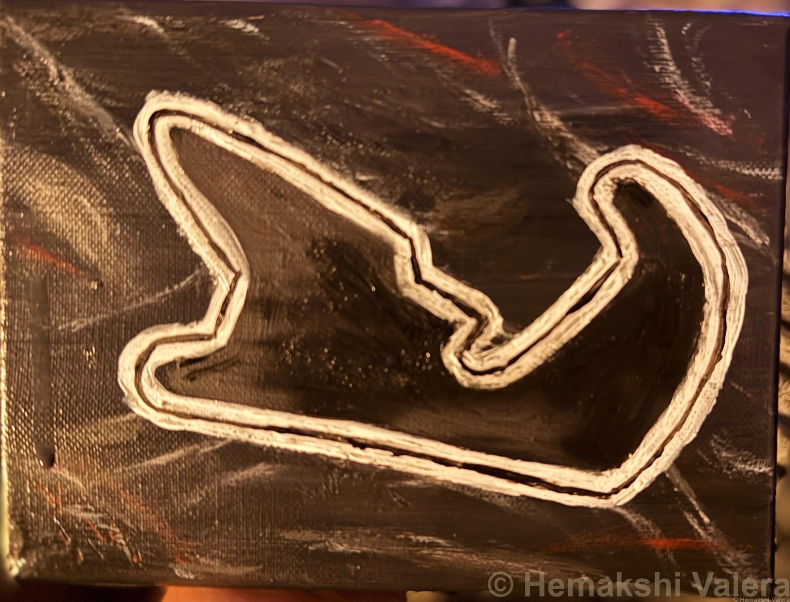 Acrylic painting of the Silverstone Formula 1 circuit outline in raised white paint on a dark textured background, by Australian artist Hemakshi Valera