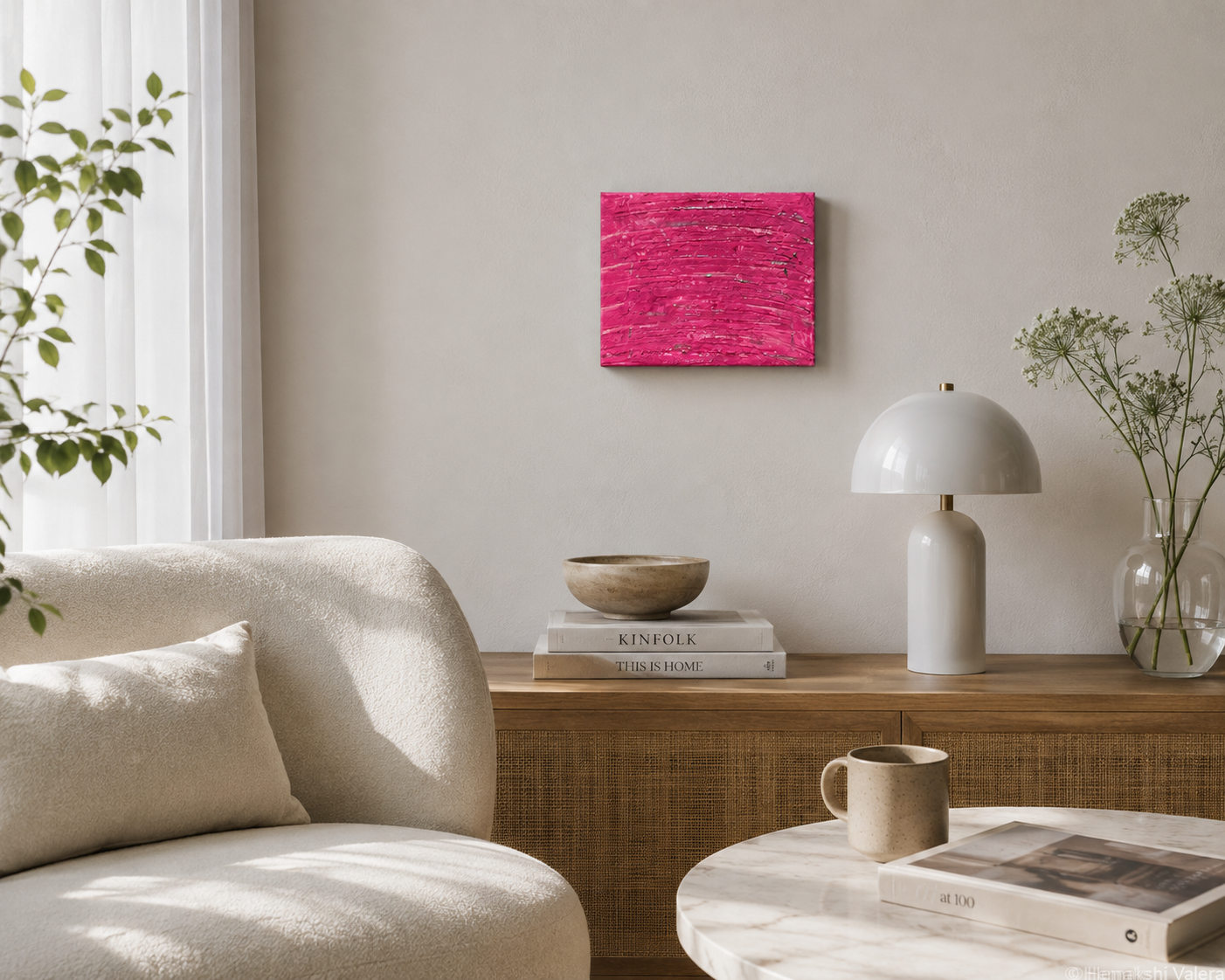 Tender Aftersound, an original hot pink and silver abstract painting, hanging above a dresser in a bright bedroom
