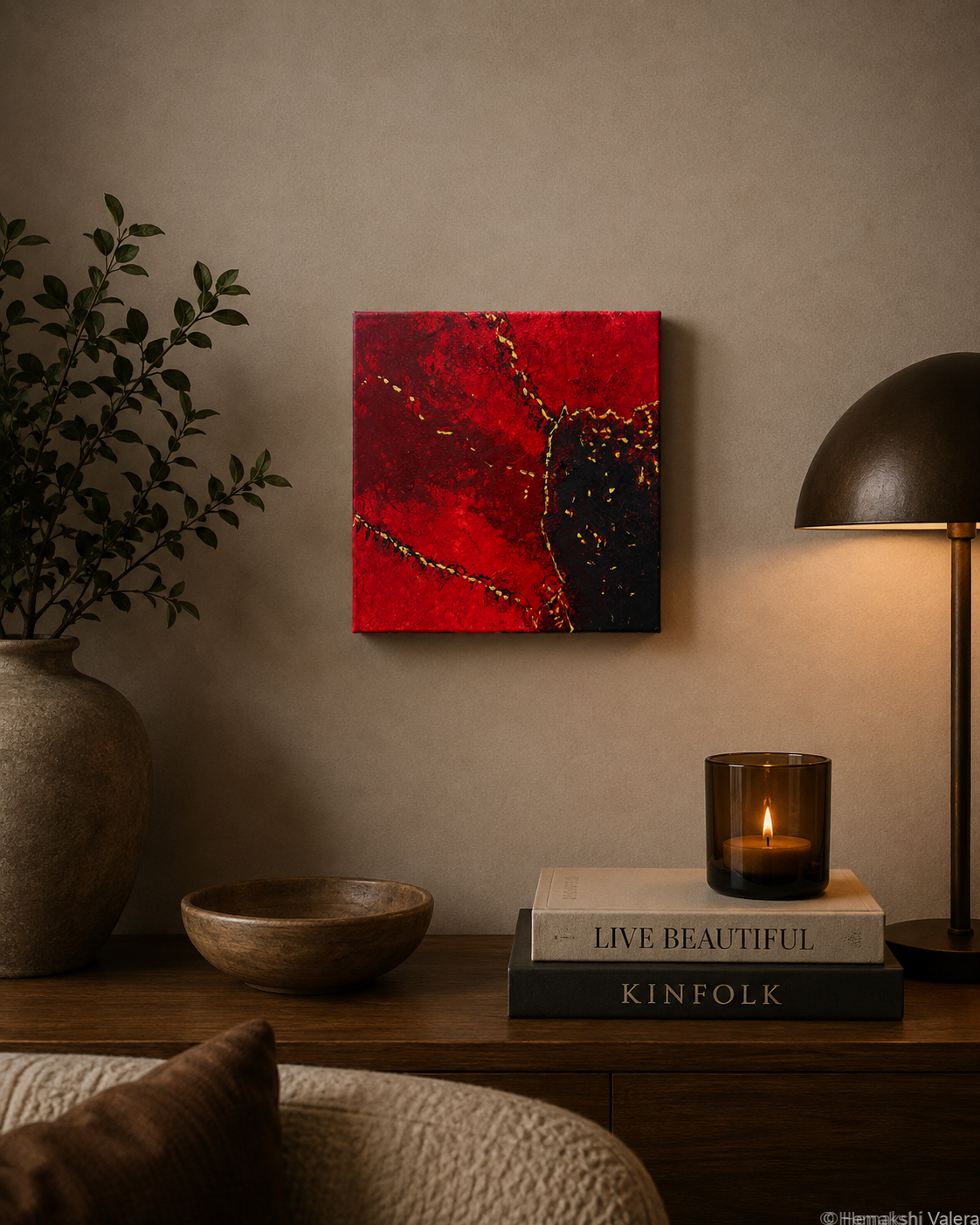 When Silence Burns, an original crimson, black and gold abstract painting, hanging above a fireplace